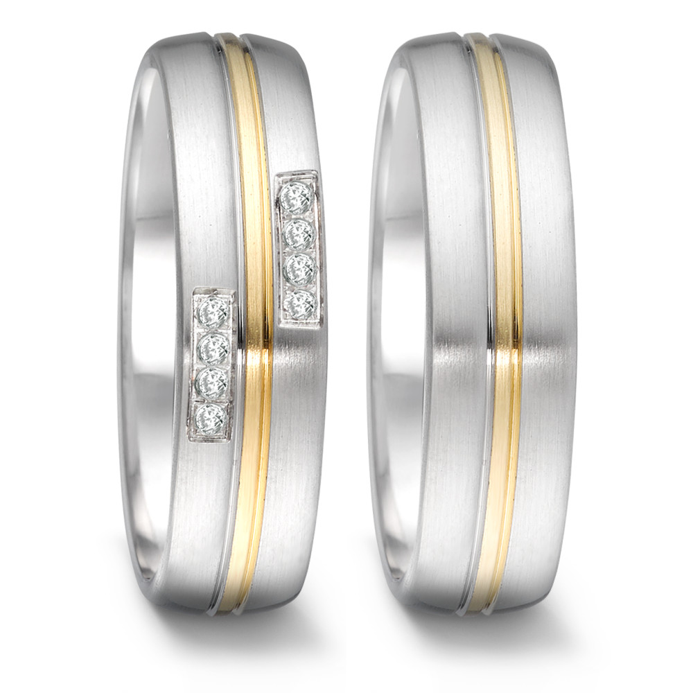 Partnerring Dieser TeNo-Partnerring macht Edelstahl und 18 Karat Gelbgold mit funkelnden Diamanten in markantem Pavé Diamant Design zu einem eleganten Schmuckstück. Er ist ideal, um ein langlebiger Begleiter für Partnerschaft, Verlobung oder den Bund fürs Leben zu sein. Mit 8 gleich grossen Diamanten von insgesamt 0,064 ct. und einer Breite von 6 mm bietet der Paarring nicht nur angenehmen Tragekomfort, sondern verleiht auch jedem Outfit einen luxuriösen, modernen Look. 068.25P01.D50.XX