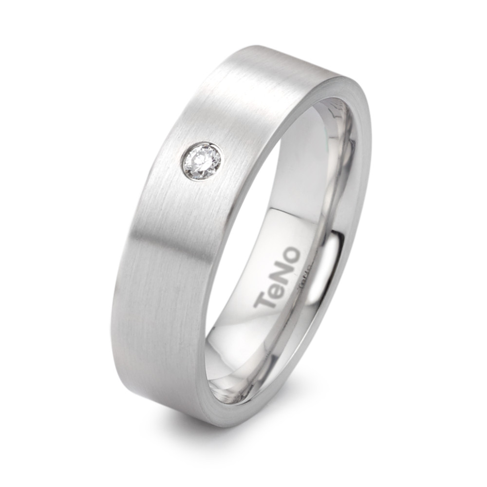 Fingerring Dieser wunderschöne Fingerring aus Edelstahl für Damen ist ein echter Hingucker! Er verfügt über einen einzelnen Diamanten mit einem Gewicht von 0,04 ct und einer Breite von 6 mm. Ausserdem wurde dieses atemberaubende Schmuckstück in Deutschland hergestellt! Sichern Sie sich dieses zeitlose Stück noch heute. 069.0214.XX