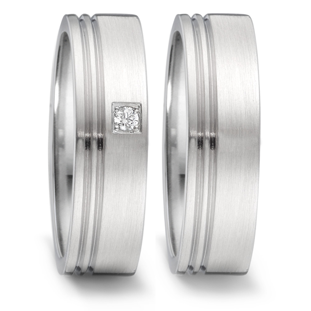 Fingerring Eleganter Damen-Fingerring aus hochwertigem Edelstahl mit matter Oberfläche und dezenter Politur. Verziert mit einem funkelnden Diamanten, der dem Ring besonderen Glanz verleiht. Modernes Design trifft auf zeitlose Schönheit – perfekt für jeden Anlass. 069.13P01.D29.XX