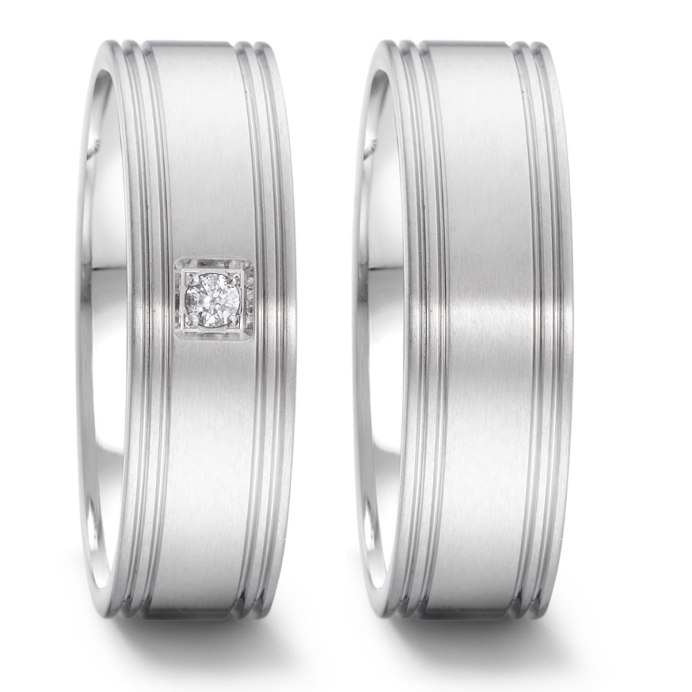 Fingerring Eleganter Damen-Fingerring aus hochwertigem Edelstahl, veredelt mit einem funkelnden Diamanten. Das zeitlose, matt gebürstete Design mit feinen Linien macht diesen Ring zum perfekten Accessoire für jeden Anlass. Robust, stilvoll und langlebig – ein Schmuckstück, das begeistert. 069.22P01.D40.XX