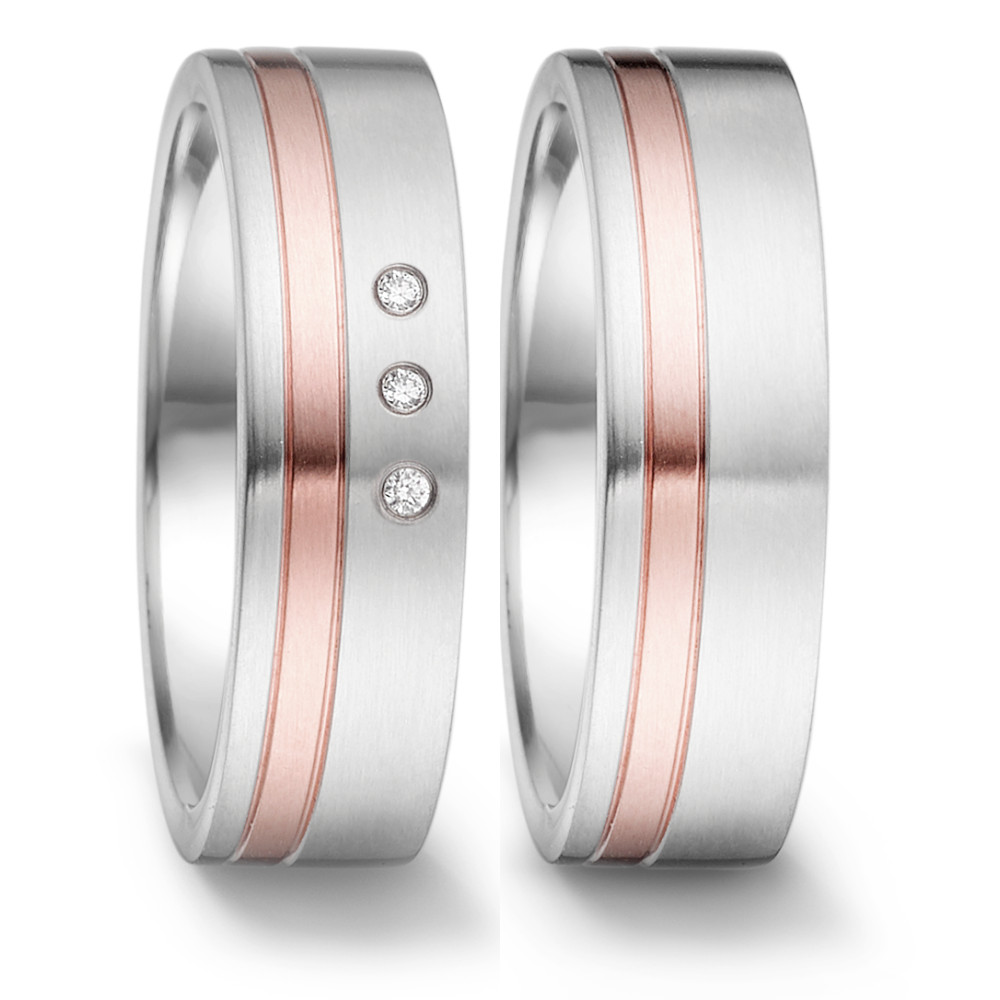 Fingerring Der TeNo Partnerring Tamor aus Edelstahl und 18-karätigem Roségold verbindet pures Design mit funkelnden Akzenten durch 3 Diamanten von insgesamt 0,024 ct. Mit 6 mm Breite und 2 mm Materialstärke ist dieser Ring ein zeitloses Schmuckstück mit kostbaren Details. Designed und hergestellt in Deutschland, um langlebige Begleiter für Partnerschaft, Verlobung oder den Bund fürs Leben zu schaffen. 068.13S01.D30RG.XX