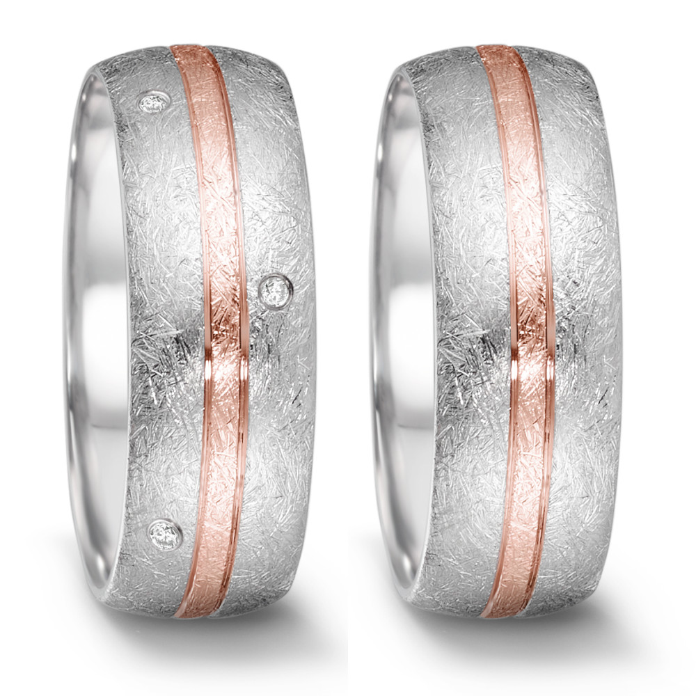 Fingerring Dieser Partnerring aus der Tamor Kollektion von TeNo verkörpert schlichte Eleganz und zeitloses Design. Er besteht aus Edelstahl und 18 Karat Roségold mit einem eismatten Finish und ist mit 8 Vollschliff Diamanten verziert, die eine luxuriöse Note verleihen. Jeder Ring ist ein Unikat mit individueller Struktur, geformt von der erfahrenen Hand des Feinschmieds und langlebiger Begleiter in Freundschaft, Beziehung oder Ehe. Entworfen und hergestellt in Deutschland. 068.26S01.D56RG.XX