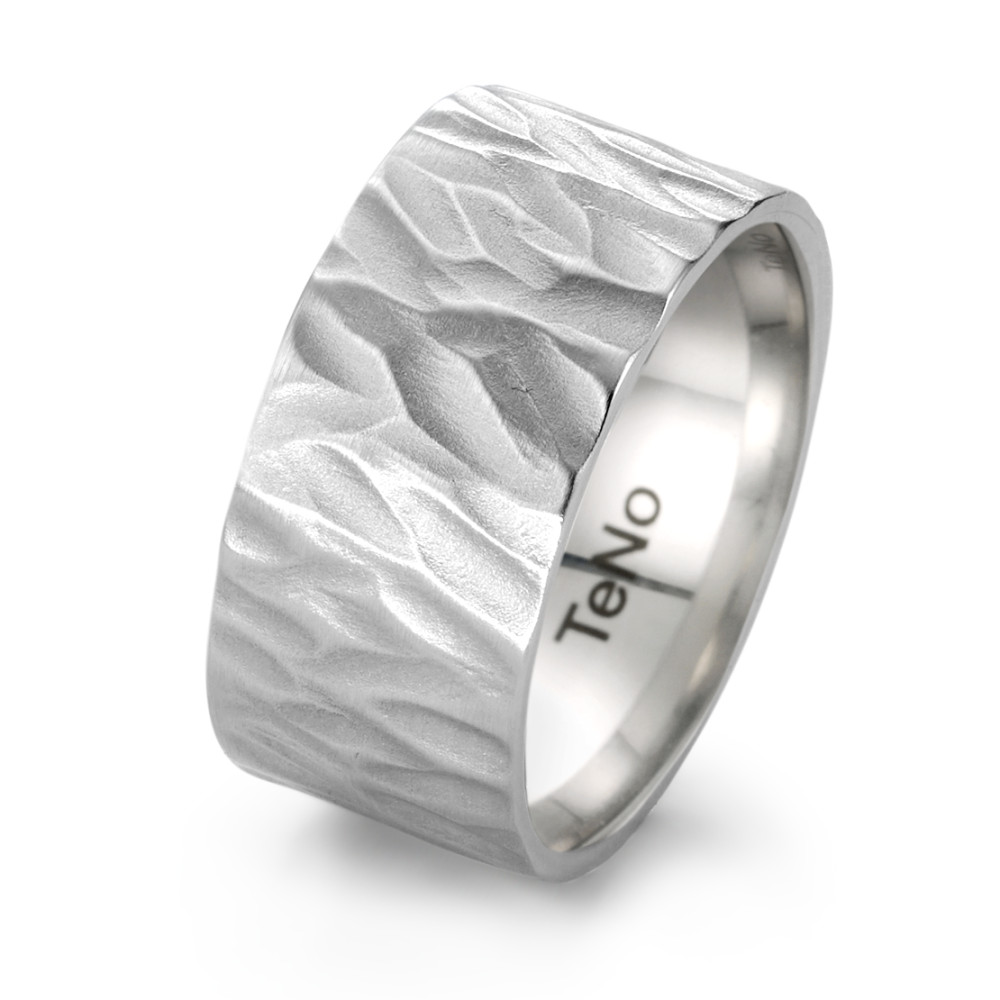 Fingerring Wir stellen Ihnen die neueste Ergänzung unserer Fingerringe vor: den Ring aus strukturiertem Edelstahl! Gefertigt aus hochwertigem Edelstahl und mit einer Breite von 12 mm ist dieser wunderschöne Ring das perfekte Accessoire für jeden Anlass. Und Sie können sich darauf verlassen, dass er in Deutschland nach höchsten Standards gefertigt wurde. Sichern Sie sich Ihren Ring noch heute! 069.1200.D87.XX