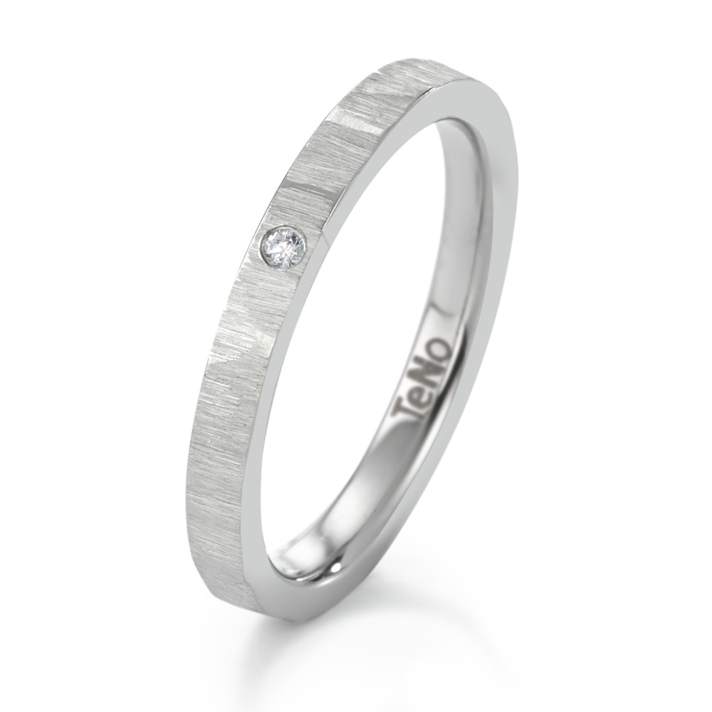 Fingerring Achtung Damen! Holen Sie sich das neuste Modeaccessoire - einen stilvollen Damenfingerring aus Edelstahl mit einem 0,012 ct tw-si Diamanten. Dieser modische Ring hat eine Breite von 2,5 mm und ist Made in Germany, so dass Sie sicher sein können, dass Sie die beste Qualität bekommen. Warten Sie nicht und bestellen Sie ihn noch heute! 069.2413.D89.XX