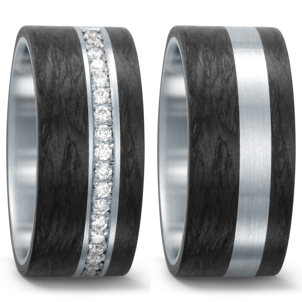 Fingerring Eleganter Damenring aus robustem Edelstahl mit edlem Carbon-Design. Der Ring ist mit funkelnden Diamanten besetzt, die für einen glamourösen Look sorgen. Ideal für stilbewusste Frauen, die modernes Design und hochwertige Materialien schätzen. Perfekt für jeden Anlass.