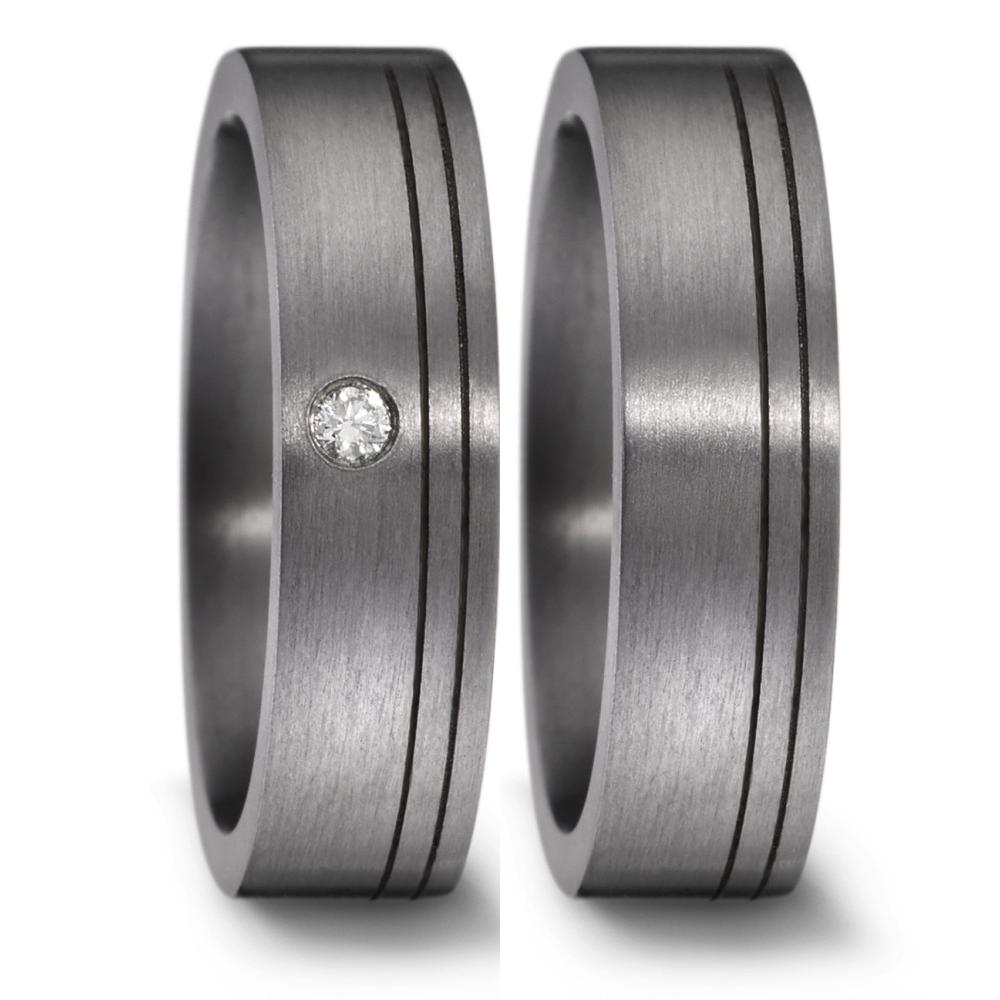 Partnerring Eleganter Damen-Partnerring aus hochwertigem 999 Tantal mit mattem Finish. Verziert mit einem funkelnden Diamanten, der für zeitlose Schönheit und besondere Momente steht. Perfekt als Symbol für Liebe und Verbundenheit in exklusivem Design.