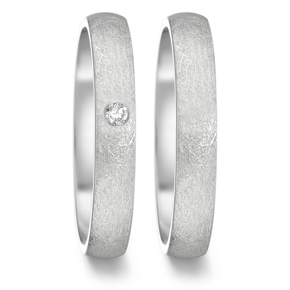 Partnerring Dieser eismattierte TeNo Ring mit einem funkelnden Diamanten von 0,04 Carat wird in traditioneller Handwerkskunst in Deutschland gefertigt. Mit einer schlanken 4 mm Comfort Fit Ringschiene bietet er angenehmen Tragekomfort und ist ein elegantes Schmuckstück. Das Eismatt-Finish verleiht jedem Ring eine einzigartige Note und macht ihn zu einem Schmuckstück für Puristen - widerstandsfähig, klar und cool.
 369.6014.XX