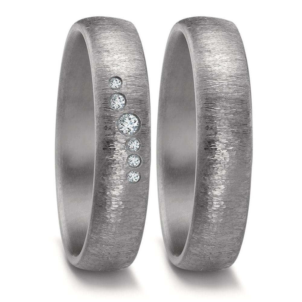 Partnerring Eleganter Damen-Partnerring aus 999er Tantal mit sieben funkelnden Diamanten in unterschiedlicher Größe. Die matte Oberfläche verleiht dem Ring einen modernen, edlen Look. Ein zeitloses Schmuckstück, das Liebe und Einzigartigkeit symbolisiert.