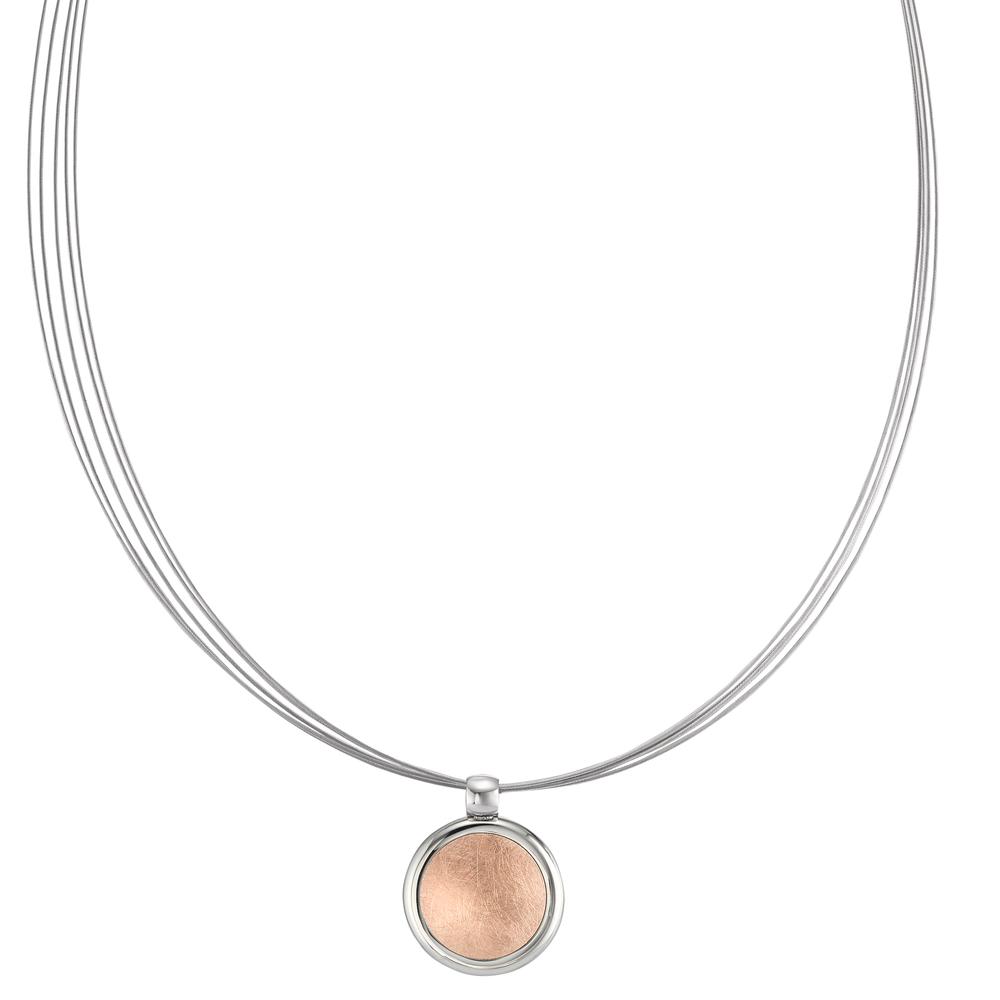 Collier Das Elyna Collier in Bicolor-Roségold aus Edelstahl von TeNo veredelt jedes Outfit und lässt auch einfache T-Shirts edler wirken. Das Herzstück dieses Seilcolliers ist der zweifarbige Anhänger. Er überzeugt durch ein aufwendig gearbeitetes Finish in Glanz-Eismatt. Der Halsreif bestehend aus 5 elastischen Edelstahlseilen, ist durch seinen Clipverschluss einfach und sicher in der Handhabung.  594258,594690