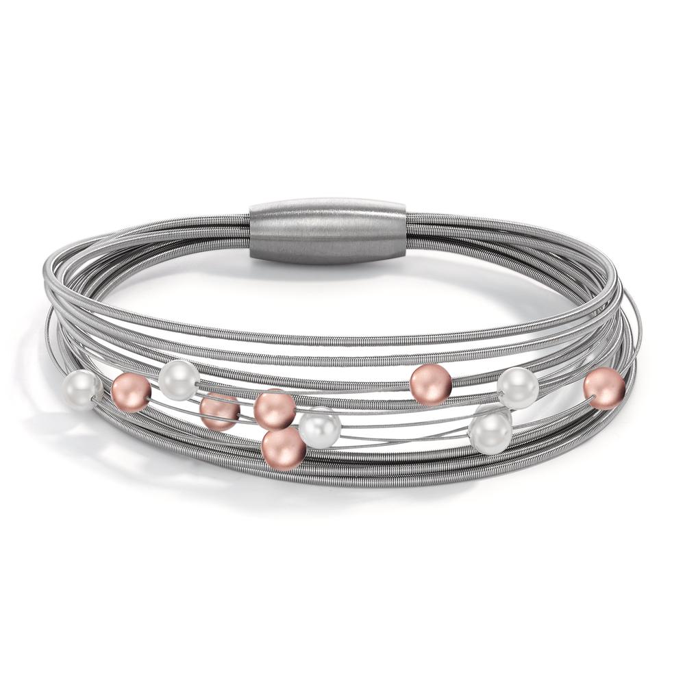 Armband Dieser TeNo Spiralarmreif Arya kann durch seinen lässigen Materialmix zu vielen Looks & Styles kombiniert werden. Natürliche Muschelperlen zusammen mit dezent roségoldfarbenen Kugeln aus Aluminium runden das zeitlose und besondere Design gelungen ab. Die gefächerten Spiralen aus Edelstahl sind sehr flexibel und lassen sich immer wieder neu am Handgelenk anordnen. Der Magnetverschluss ist mit einer Hand gut zu handeln und hält die elastischen Edelstahlspiralen fest zusammen. 