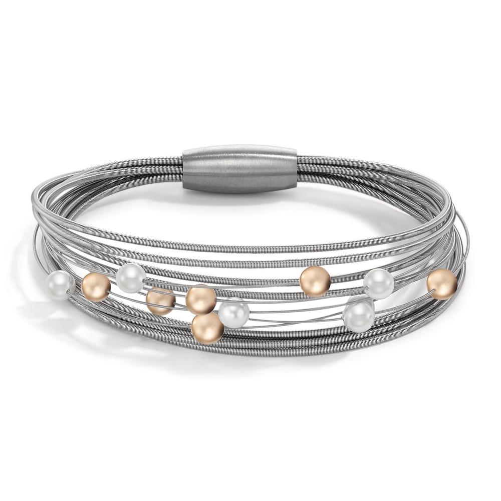 Armband Dieser TeNo Perlarmreif Arya ist ein toller Eyecatcher und attraktiver Begleiter für einen extravaganten Auftritt. Natürliche Muschelperlen im Mix mit dezent goldfarbenem Aluminium runden das besondere Design gelungen ab. Die gefächerten Spiralen aus Edelstahl sind sehr flexibel und können nach Lust und Laune immer wieder neu angeordnet werden. Der Magnetverschluss ist mit einer Hand gut zu handeln und hält die elastischen Edelstahlspiralen fest zusammen. 